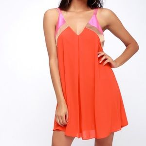 Lulu’s Bright on coral color block swing dress. Sm